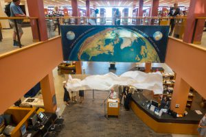 Kingman NYT mural dedicated at the Dale Clark Library, Maureen Waldron, and the Kingman daughters present.